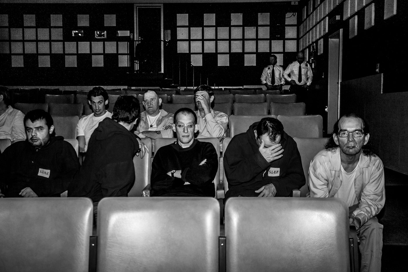Prisoners watching a movie inside the movie theatre of the prison of Ghent, Belgium, April 2014.